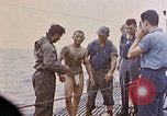 Image of US submarine rescues survivors from Japanese boat Pacific Ocean, 1945, second 30 stock footage video 65675052640