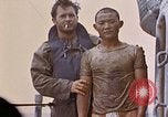 Image of US submarine rescues survivors from Japanese boat Pacific Ocean, 1945, second 36 stock footage video 65675052640