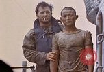 Image of US submarine rescues survivors from Japanese boat Pacific Ocean, 1945, second 37 stock footage video 65675052640