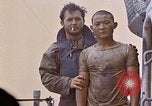 Image of US submarine rescues survivors from Japanese boat Pacific Ocean, 1945, second 38 stock footage video 65675052640