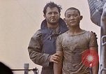 Image of US submarine rescues survivors from Japanese boat Pacific Ocean, 1945, second 39 stock footage video 65675052640