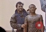 Image of US submarine rescues survivors from Japanese boat Pacific Ocean, 1945, second 41 stock footage video 65675052640