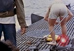 Image of US submarine rescues survivors from Japanese boat Pacific Ocean, 1945, second 50 stock footage video 65675052640