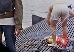 Image of US submarine rescues survivors from Japanese boat Pacific Ocean, 1945, second 51 stock footage video 65675052640