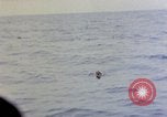 Image of US submarine rescues survivors from Japanese boat Pacific Ocean, 1945, second 55 stock footage video 65675052640