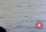Image of US submarine rescues survivors from Japanese boat Pacific Ocean, 1945, second 56 stock footage video 65675052640