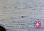 Image of US submarine rescues survivors from Japanese boat Pacific Ocean, 1945, second 57 stock footage video 65675052640