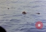 Image of US submarine rescues survivors from Japanese boat Pacific Ocean, 1945, second 58 stock footage video 65675052640