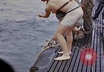 Image of US submarine rescues survivors from Japanese boat Pacific Ocean, 1945, second 60 stock footage video 65675052640