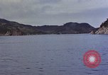 Image of US submarine firing 5 inch guns at targets in Japanese waters Japan, 1945, second 3 stock footage video 65675052641