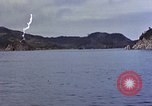 Image of US submarine firing 5 inch guns at targets in Japanese waters Japan, 1945, second 4 stock footage video 65675052641