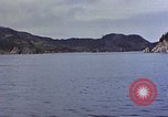 Image of US submarine firing 5 inch guns at targets in Japanese waters Japan, 1945, second 5 stock footage video 65675052641