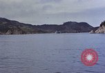 Image of US submarine firing 5 inch guns at targets in Japanese waters Japan, 1945, second 8 stock footage video 65675052641