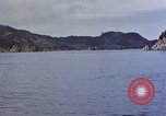 Image of US submarine firing 5 inch guns at targets in Japanese waters Japan, 1945, second 9 stock footage video 65675052641