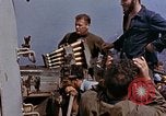 Image of US submarine firing 5 inch guns at targets in Japanese waters Japan, 1945, second 11 stock footage video 65675052641