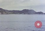 Image of US submarine firing 5 inch guns at targets in Japanese waters Japan, 1945, second 16 stock footage video 65675052641