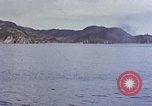 Image of US submarine firing 5 inch guns at targets in Japanese waters Japan, 1945, second 17 stock footage video 65675052641