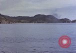 Image of US submarine firing 5 inch guns at targets in Japanese waters Japan, 1945, second 18 stock footage video 65675052641