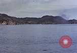 Image of US submarine firing 5 inch guns at targets in Japanese waters Japan, 1945, second 20 stock footage video 65675052641