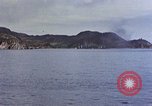 Image of US submarine firing 5 inch guns at targets in Japanese waters Japan, 1945, second 21 stock footage video 65675052641
