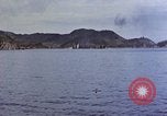 Image of US submarine firing 5 inch guns at targets in Japanese waters Japan, 1945, second 22 stock footage video 65675052641