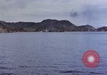 Image of US submarine firing 5 inch guns at targets in Japanese waters Japan, 1945, second 24 stock footage video 65675052641