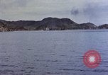 Image of US submarine firing 5 inch guns at targets in Japanese waters Japan, 1945, second 25 stock footage video 65675052641
