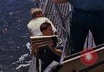 Image of US submarine firing 5 inch guns at targets in Japanese waters Japan, 1945, second 28 stock footage video 65675052641