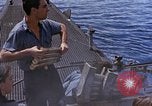 Image of US submarine firing 5 inch guns at targets in Japanese waters Japan, 1945, second 29 stock footage video 65675052641