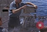 Image of US submarine firing 5 inch guns at targets in Japanese waters Japan, 1945, second 30 stock footage video 65675052641
