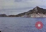 Image of US submarine firing 5 inch guns at targets in Japanese waters Japan, 1945, second 36 stock footage video 65675052641