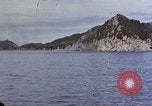 Image of US submarine firing 5 inch guns at targets in Japanese waters Japan, 1945, second 40 stock footage video 65675052641
