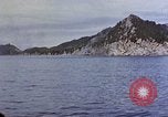 Image of US submarine firing 5 inch guns at targets in Japanese waters Japan, 1945, second 41 stock footage video 65675052641