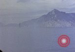 Image of US submarine firing 5 inch guns at targets in Japanese waters Japan, 1945, second 43 stock footage video 65675052641