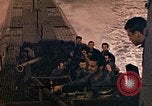 Image of US submarine firing 5 inch guns at targets in Japanese waters Japan, 1945, second 48 stock footage video 65675052641