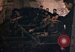 Image of US submarine firing 5 inch guns at targets in Japanese waters Japan, 1945, second 52 stock footage video 65675052641