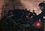 Image of US submarine firing 5 inch guns at targets in Japanese waters Japan, 1945, second 54 stock footage video 65675052641