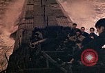 Image of US submarine firing 5 inch guns at targets in Japanese waters Japan, 1945, second 55 stock footage video 65675052641