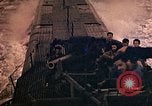 Image of US submarine firing 5 inch guns at targets in Japanese waters Japan, 1945, second 57 stock footage video 65675052641