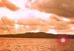 Image of US submarine firing 5 inch guns at targets in Japanese waters Japan, 1945, second 60 stock footage video 65675052641