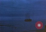 Image of US submarine, USS Tirante (SS-420) attacks Japanese Junk Pacific Ocean, 1945, second 24 stock footage video 65675052643