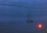 Image of US submarine, USS Tirante (SS-420) attacks Japanese Junk Pacific Ocean, 1945, second 28 stock footage video 65675052643