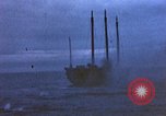 Image of US submarine, USS Tirante (SS-420) attacks Japanese Junk Pacific Ocean, 1945, second 38 stock footage video 65675052643