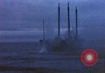 Image of US submarine, USS Tirante (SS-420) attacks Japanese Junk Pacific Ocean, 1945, second 39 stock footage video 65675052643