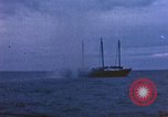 Image of US submarine, USS Tirante (SS-420) attacks Japanese Junk Pacific Ocean, 1945, second 51 stock footage video 65675052643
