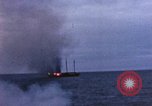 Image of US submarine, USS Tirante (SS-420) attacks Japanese Junk Pacific Ocean, 1945, second 55 stock footage video 65675052643