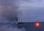 Image of US submarine, USS Tirante (SS-420) attacks Japanese Junk Pacific Ocean, 1945, second 57 stock footage video 65675052643