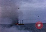 Image of US submarine, USS Tirante (SS-420) attacks Japanese Junk Pacific Ocean, 1945, second 58 stock footage video 65675052643