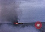 Image of US submarine, USS Tirante (SS-420) attacks Japanese Junk Pacific Ocean, 1945, second 60 stock footage video 65675052643