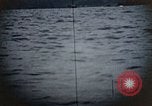 Standbild US Submarine Torpedos japanischen Frachter Japan, 1945, aus Sekunde 24 historischem Filmmaterial Videoclip 65675052644